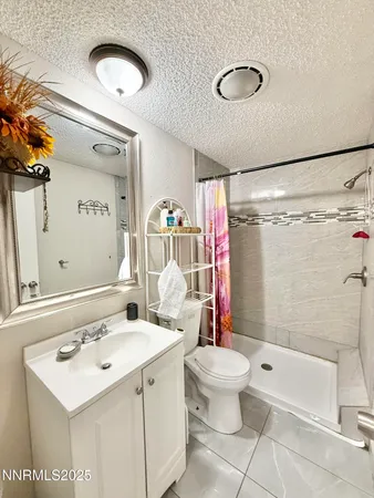 a room with furniture a washer and dryer