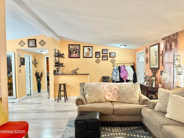 a living room with furniture and a couch