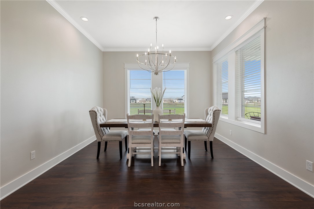 7844 Mathis Crk Drive Bryan, TX 77808 - Photo 18 of 48 a view of a dining room with furniture window and outside view