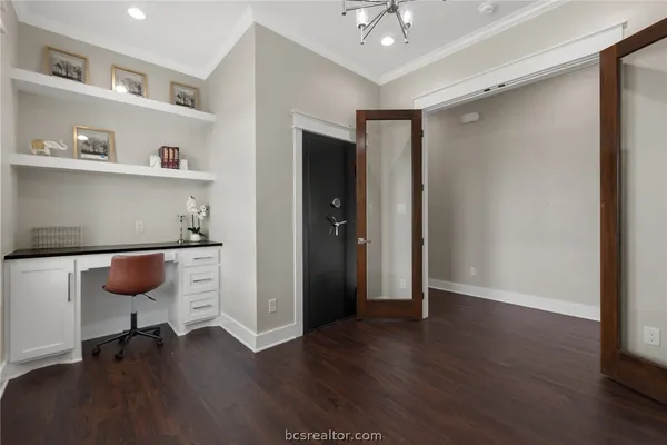 a view of workspace with wooden floor