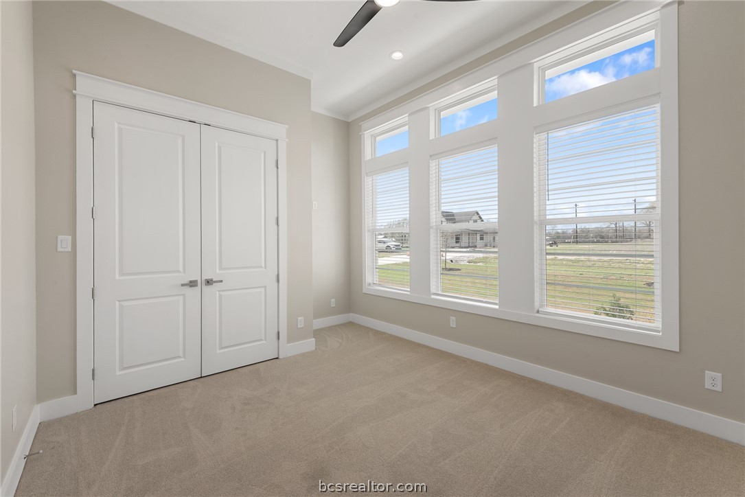 7844 Mathis Crk Drive Bryan, TX 77808 - Photo 32 of 48 a view of an empty room with a window