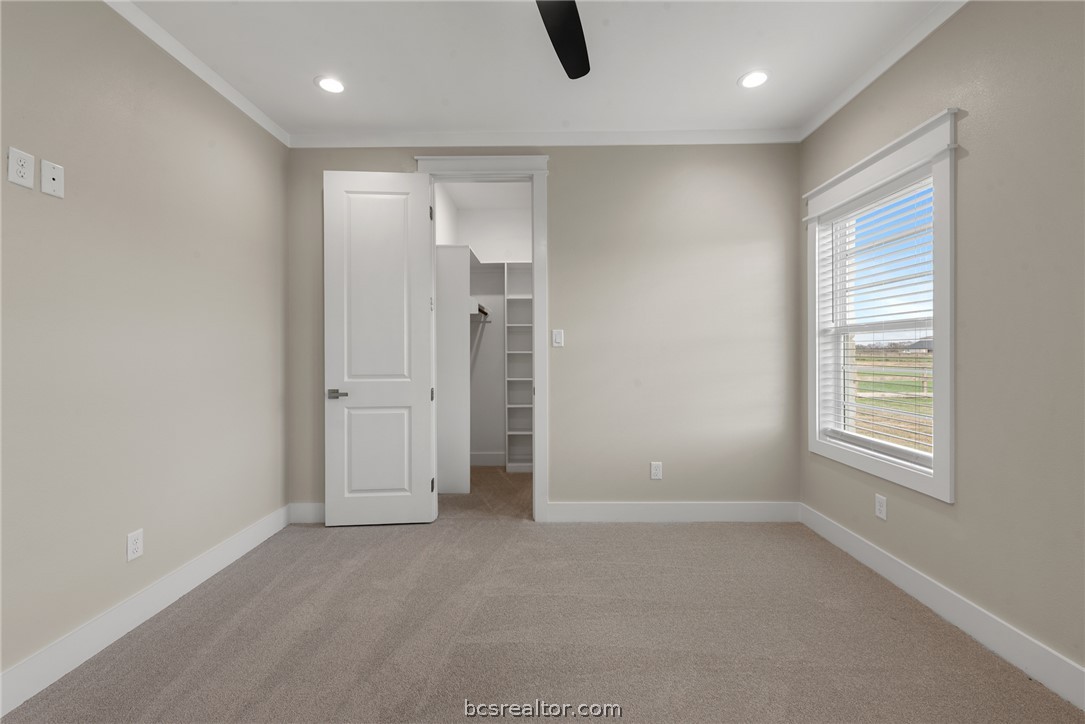 7844 Mathis Crk Drive Bryan, TX 77808 - Photo 34 of 48 an empty room with windows