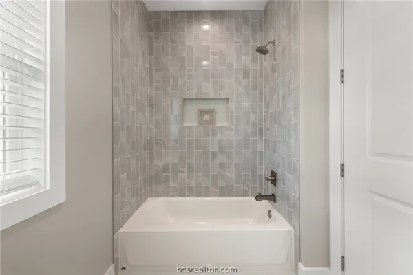 a bathroom with a bathtub