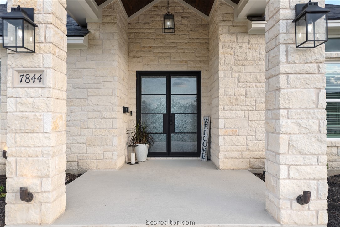 7844 Mathis Crk Drive Bryan, TX 77808 - Photo 4 of 48 a view of front door of house