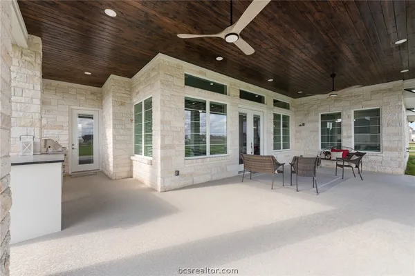 a view of a lobby with chair and tables