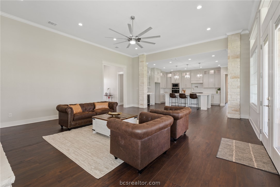 7844 Mathis Crk Drive Bryan, TX 77808 - Photo 9 of 48 a living room with furniture and a view of kitchen