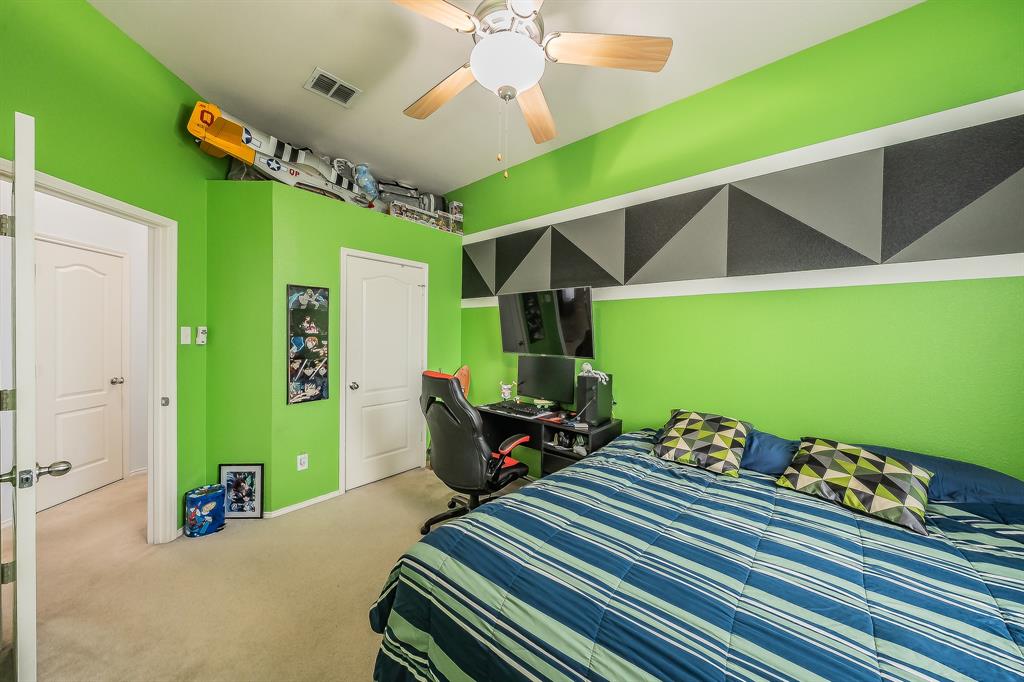 8312 Trinity Vista Trail Hurst, TX 76053 - Photo 33 of 37 Bedroom featuring carpet floors and a ceiling fan
