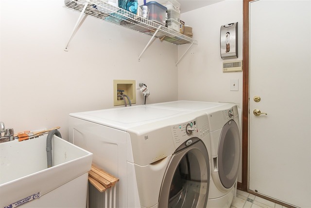 1230 Coldspring Road, Unit 1230 Elgin, IL 60120 - Photo 18 of 21 a utility room with dryer and washer