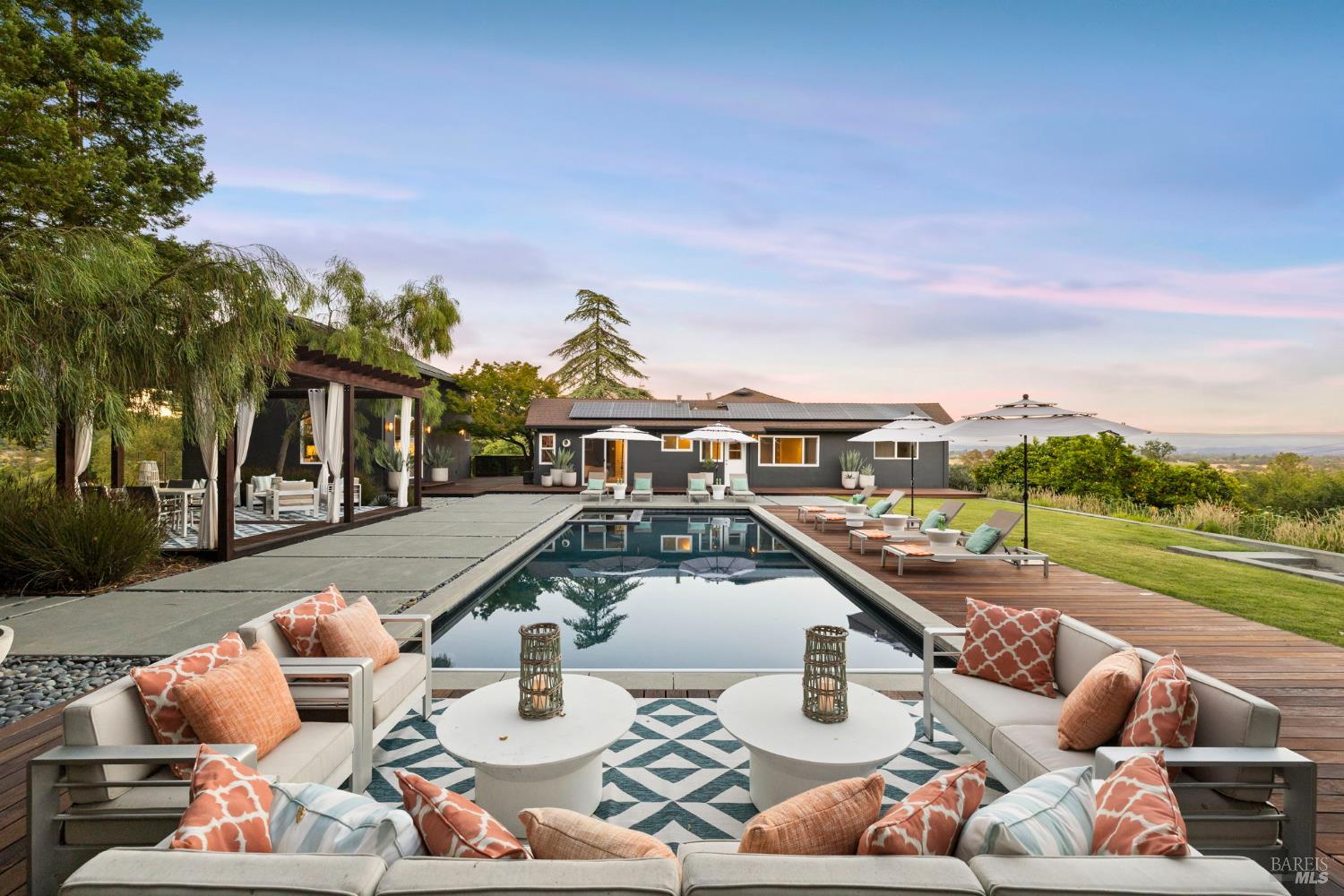 2563 Laguna Road Santa Rosa, CA 95401 - Photo 11 of 63 The saltwater pool, with its in-pool spa, anchors the upper grounds. Around it: a redwood pergola for long afternoons, ipe decks that weather to silver, a double outdoor shower designed for two. Every element exudes a particular California confidence — unforced, sensory, deeply pleasurable to inhabit.