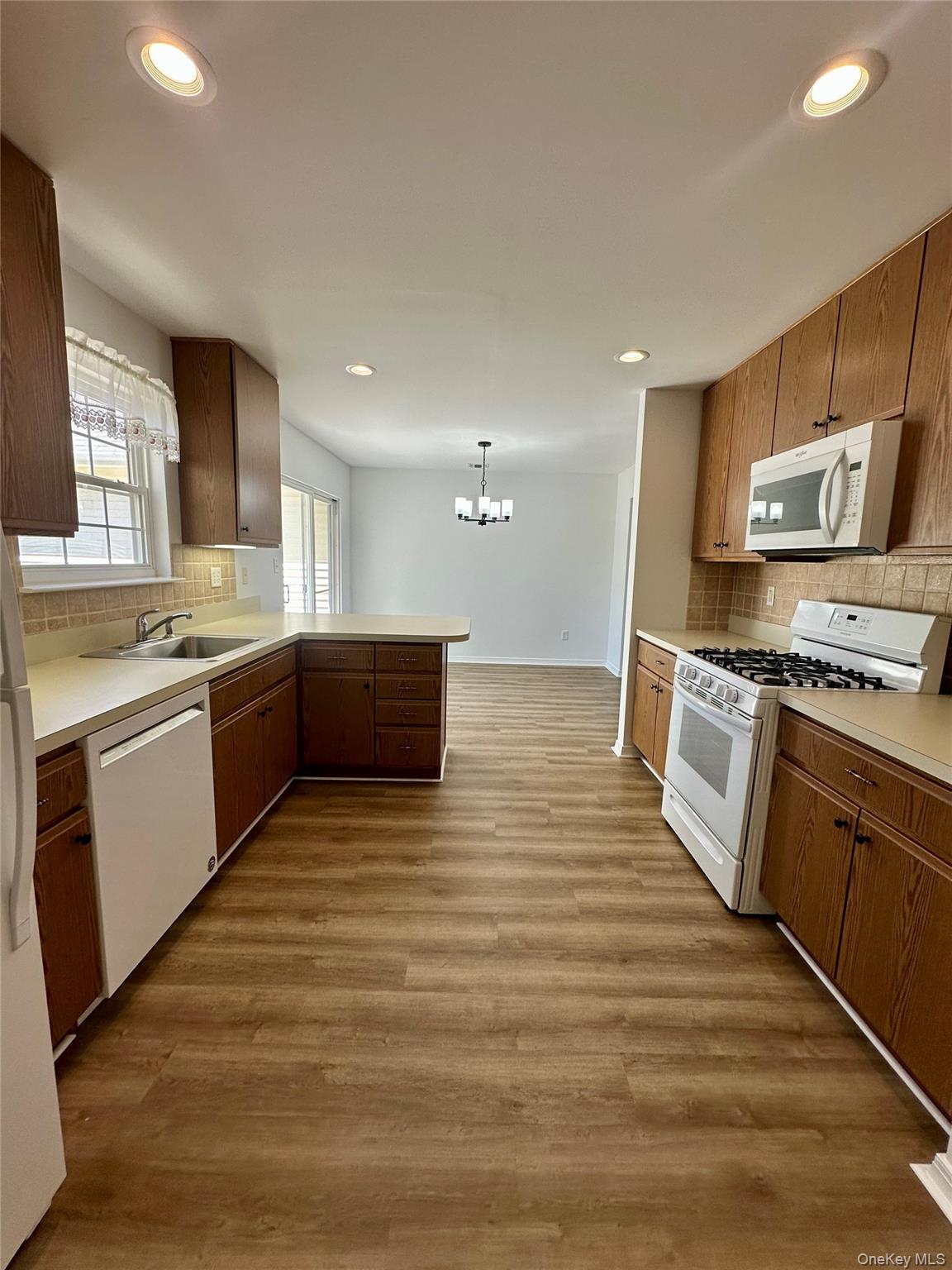 1403 Pebble Beach Path Riverhead, NY 11901 - Photo 13 of 35 Full kitchen with a spacious food pantry.