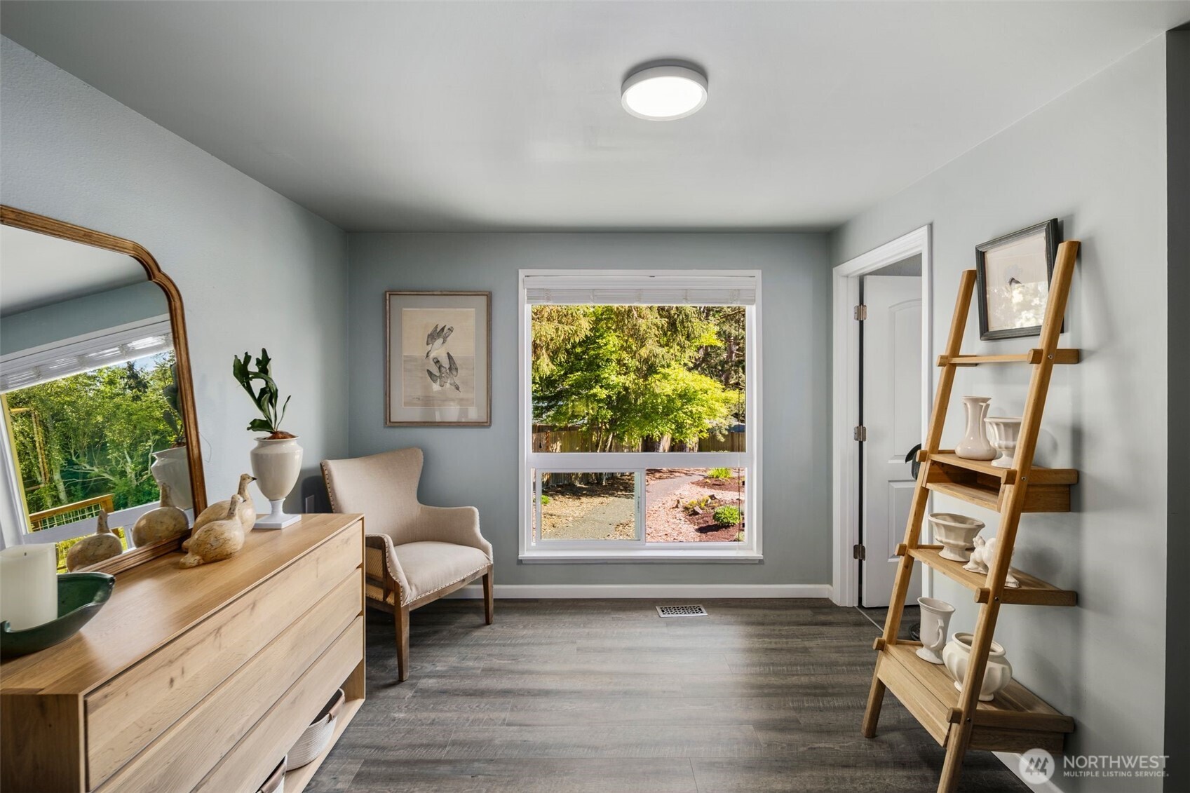 734 Shore Road Port Angeles, WA 98362 - Photo 16 of 40 a living room with furniture and a window