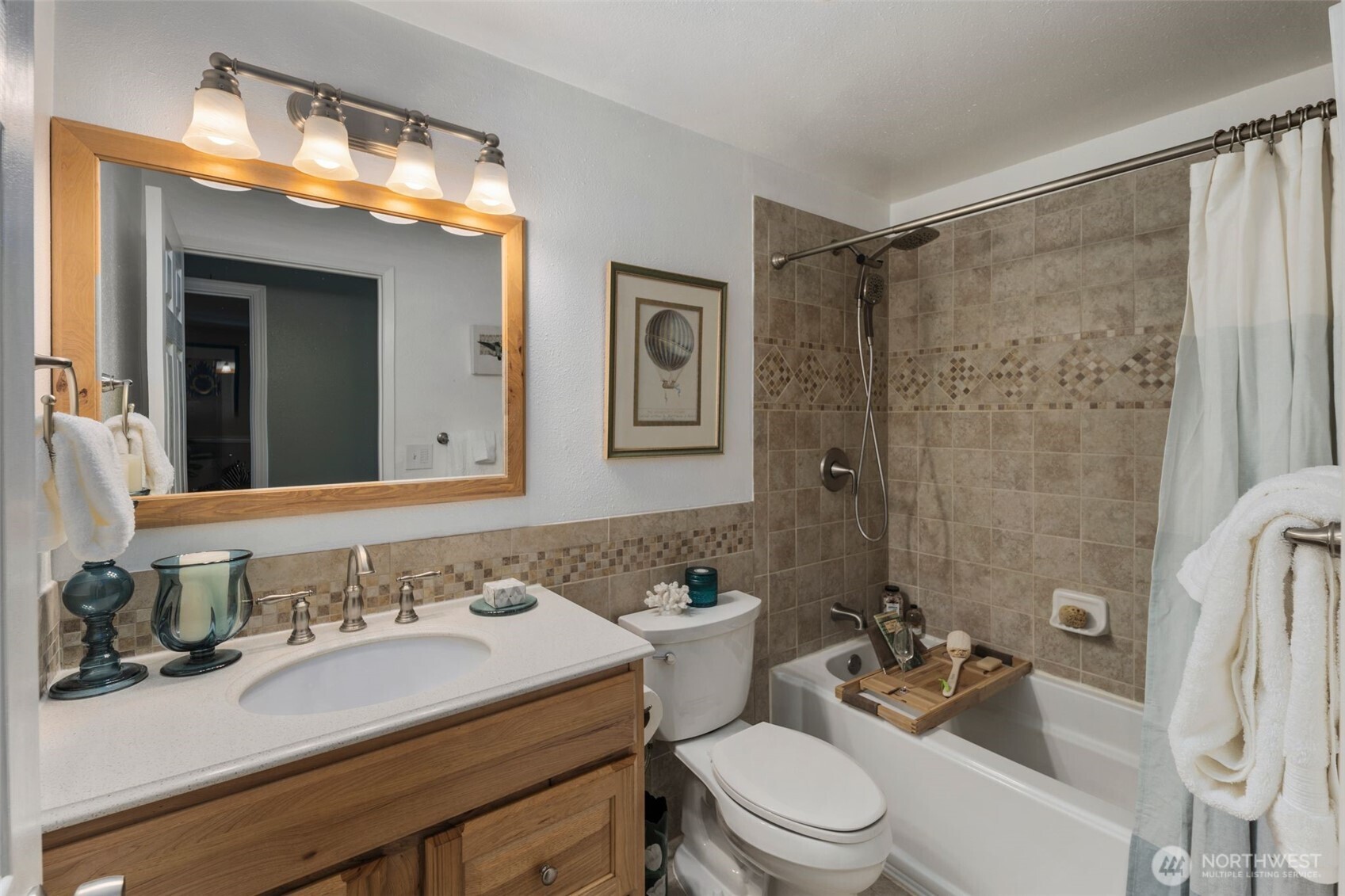 734 Shore Road Port Angeles, WA 98362 - Photo 19 of 40 a bathroom with a sink vanity granite toilet tub and shower