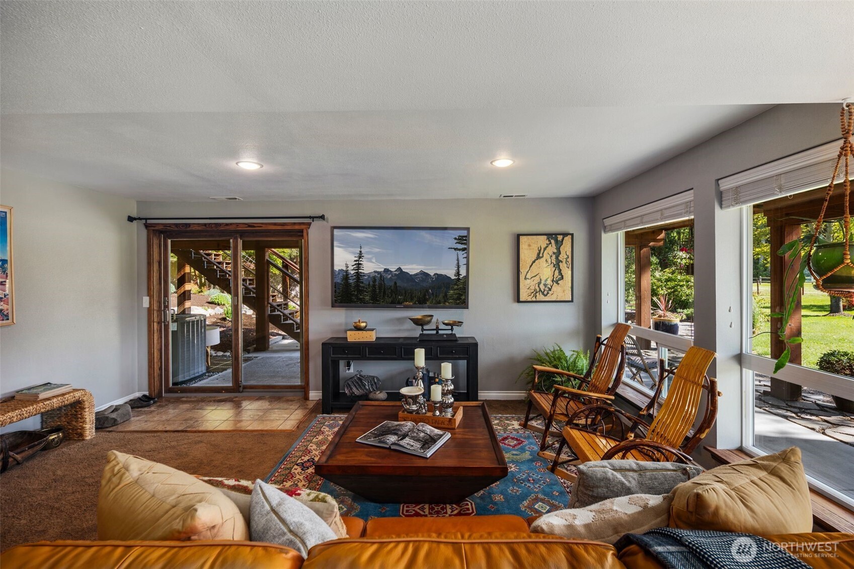 734 Shore Road Port Angeles, WA 98362 - Photo 22 of 40 a living room with furniture a window and a flat screen tv
