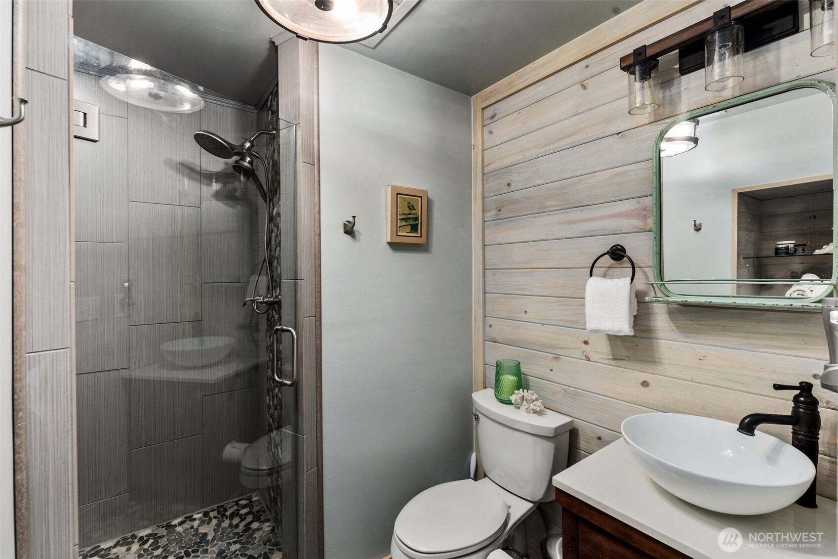 734 Shore Road Port Angeles, WA 98362 - Photo 24 of 40 a bathroom with a sink toilet and shower