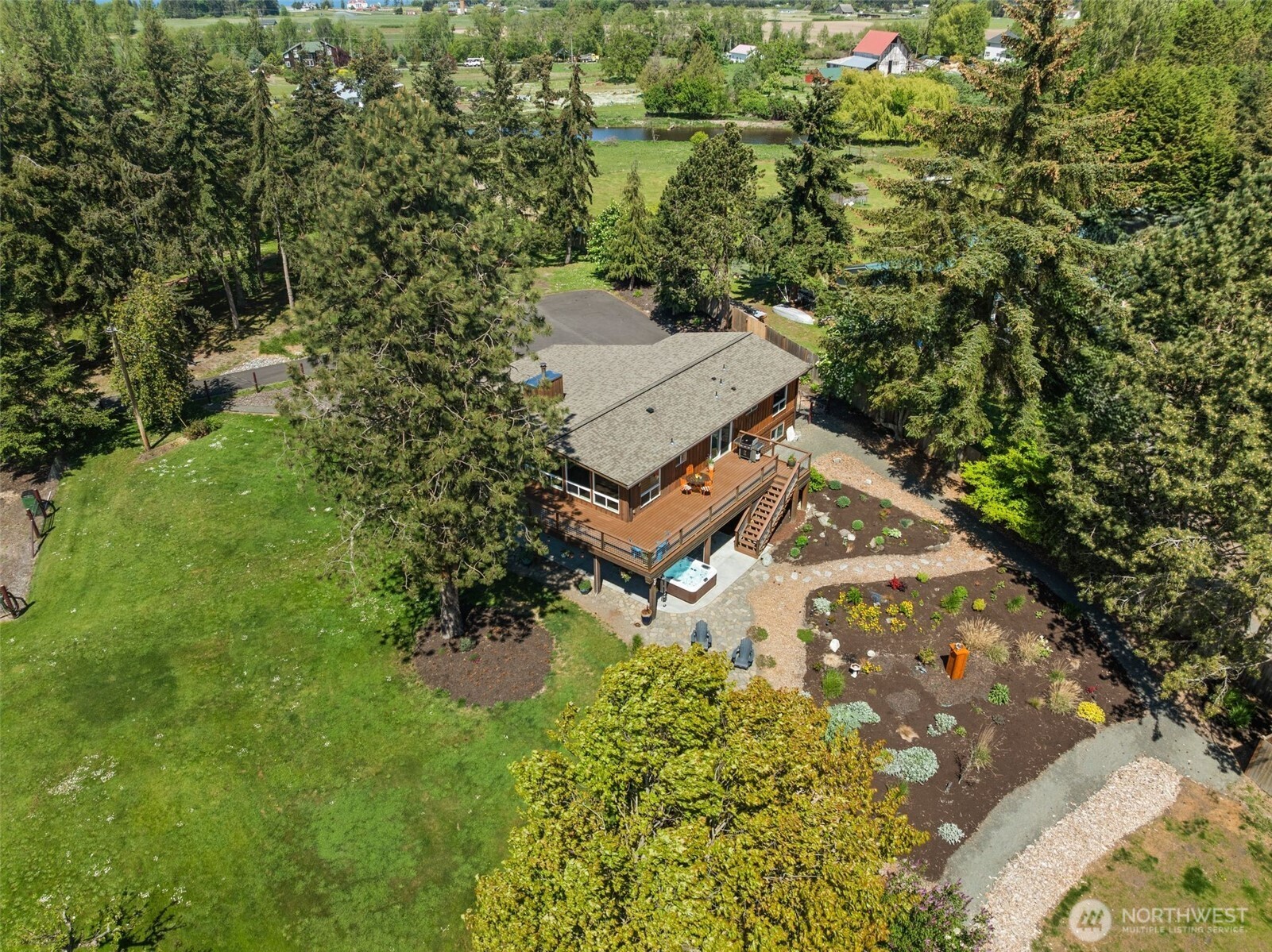 734 Shore Road Port Angeles, WA 98362 - Photo 37 of 40 an aerial view of a house with a yard