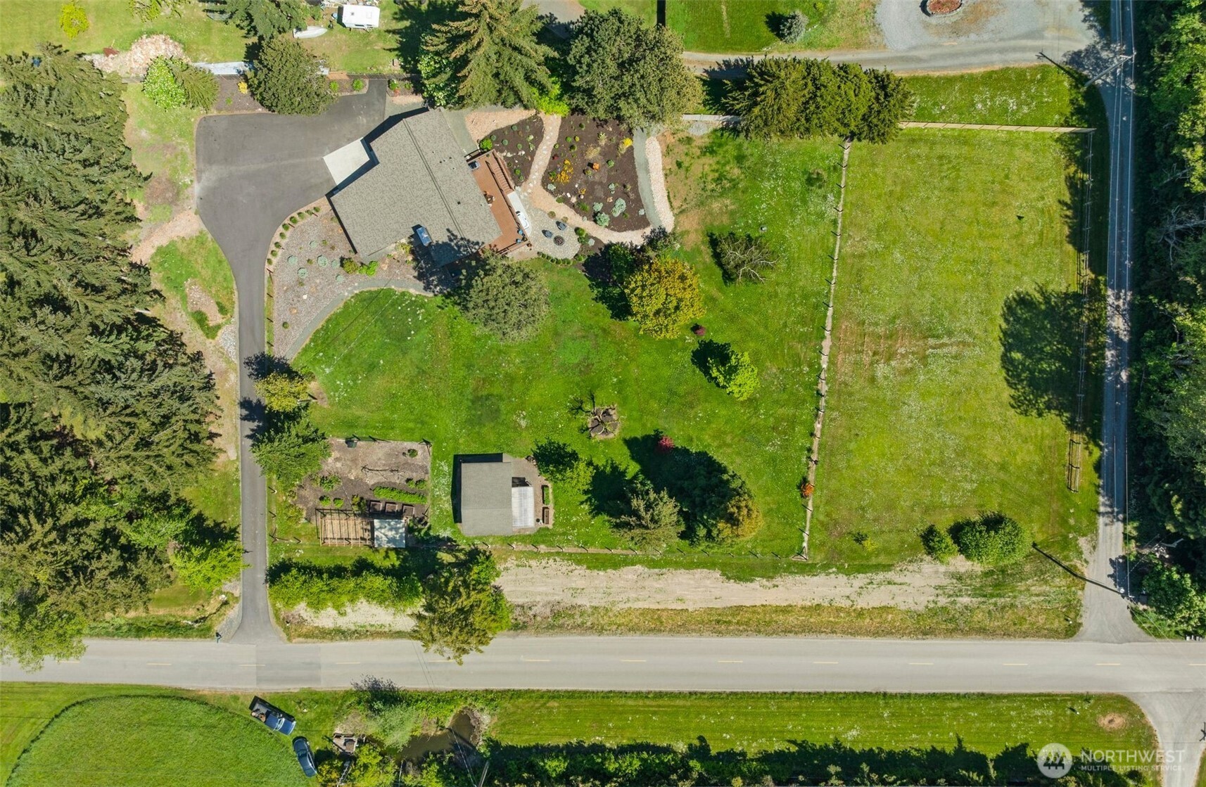 734 Shore Road Port Angeles, WA 98362 - Photo 38 of 40 an aerial view of a residential houses with yard
