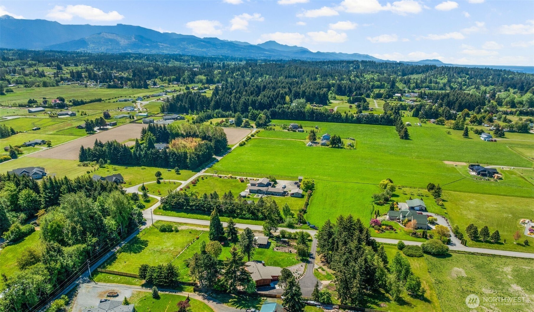 734 Shore Road Port Angeles, WA 98362 - Photo 39 of 40 a view of a city with mountains in the background