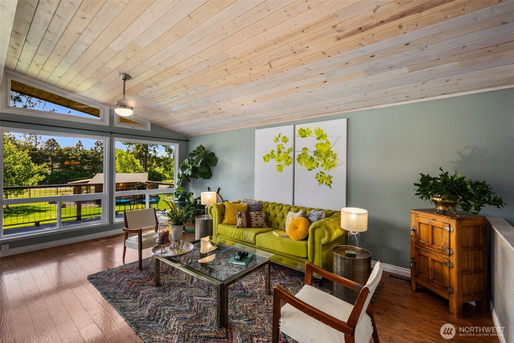 734 Shore Road Port Angeles, WA 98362 - Photo 6 of 40 a living room with furniture and a flat screen tv