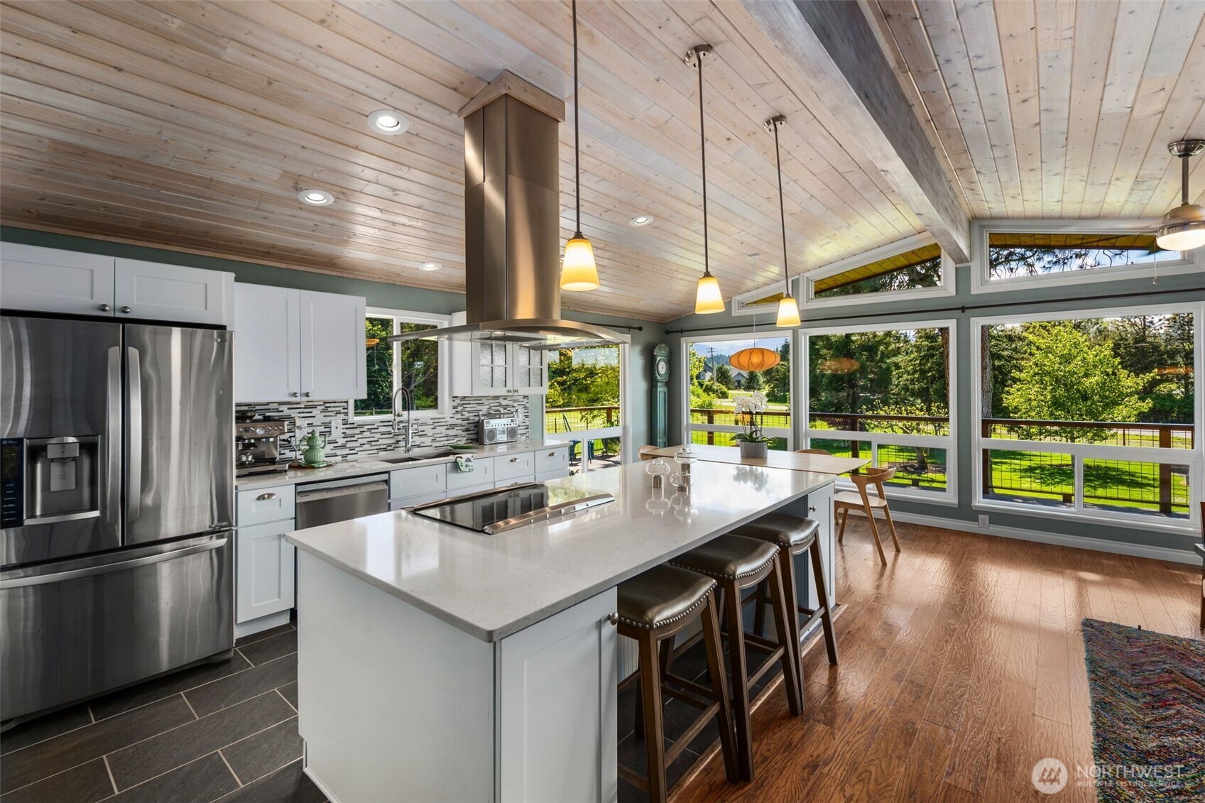 734 Shore Road Port Angeles, WA 98362 - Photo 8 of 40 a kitchen with stainless steel appliances granite countertop a sink and a stove