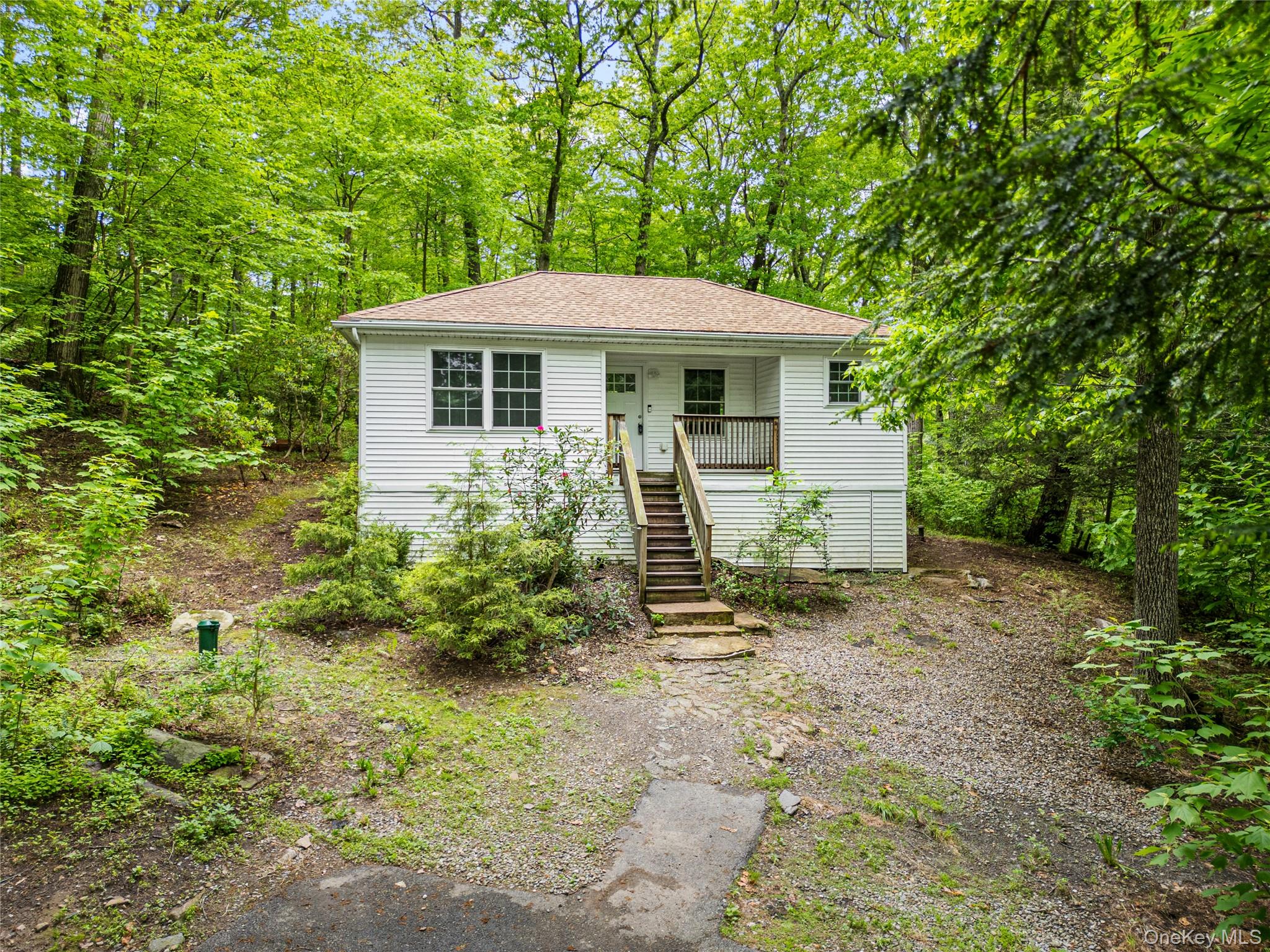 333 Wixon Pond Road Mahopac, NY 10541 - Photo 1 of 18 View of front of house featuring stairs, covered porch, and a shingled roof