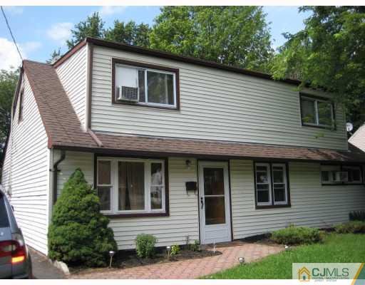 15 Mercury Road Edison, NJ 08817 - Photo 1 of 10 a front view of a house with garden