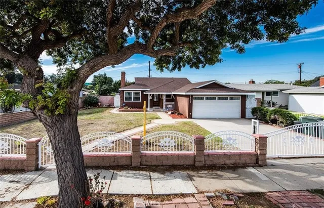 a view of a house with a swimming pool
