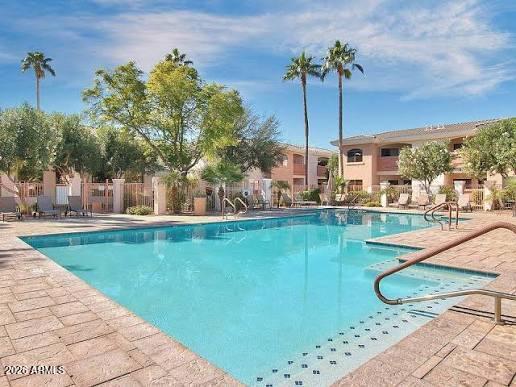 10030 West Indian School Road, Unit 133 Phoenix, AZ 85037 - Photo 17 of 17 a view of swimming pool