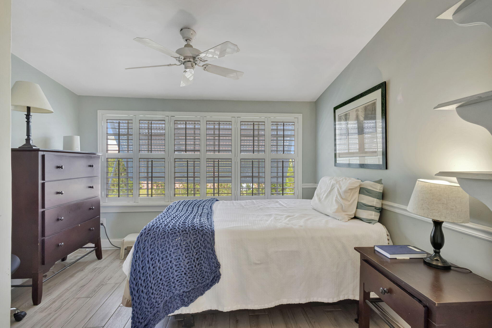 2940 Southeast Treasure Island Road Port St. Lucie, FL 34952 - Photo 19 of 61 a bed room with a bed and a window