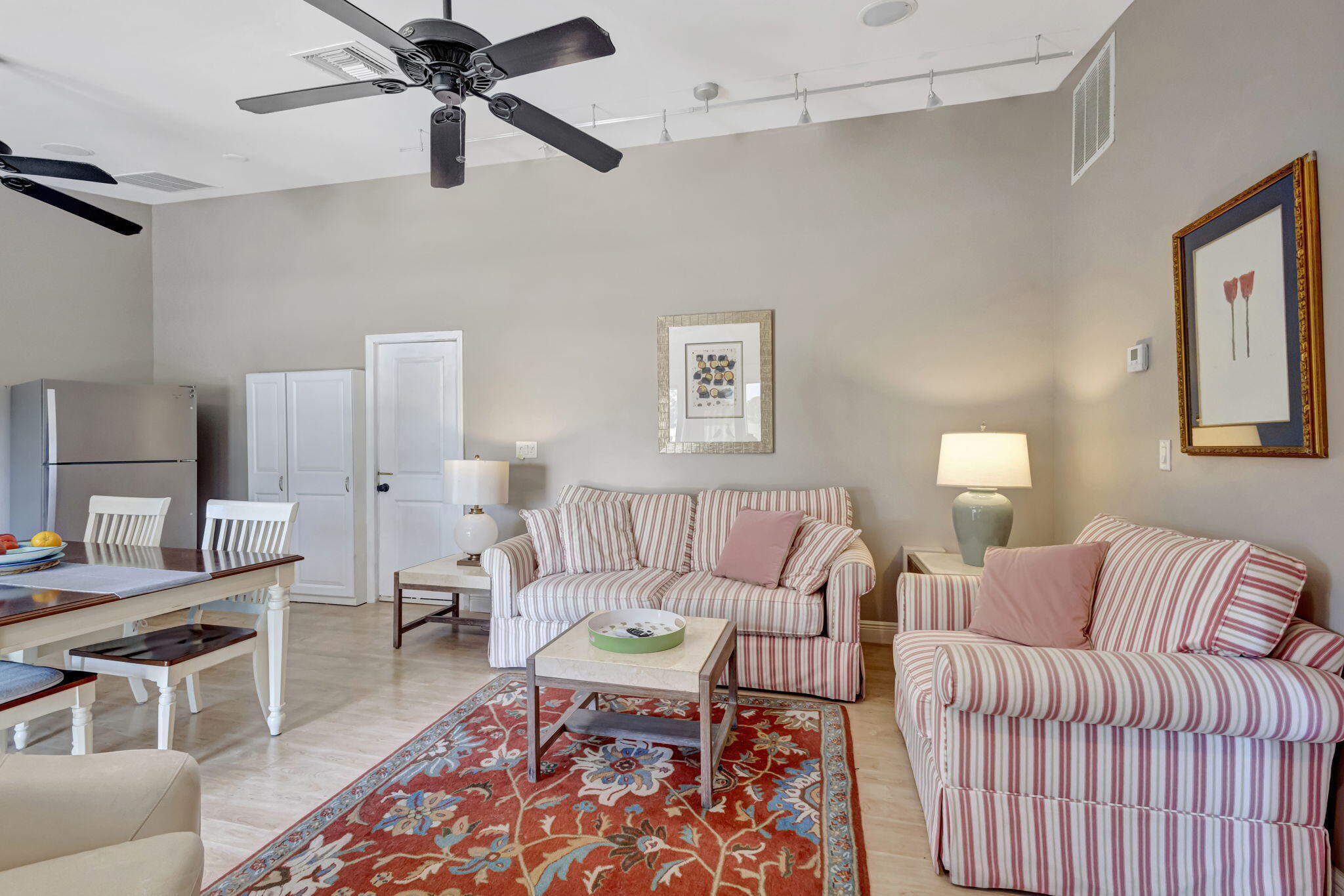 2940 Southeast Treasure Island Road Port St. Lucie, FL 34952 - Photo 26 of 61 a living room with furniture and a rug