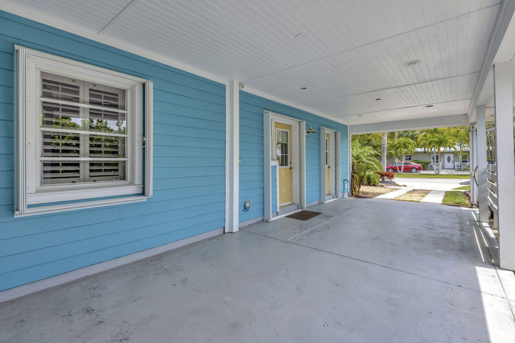 2940 Southeast Treasure Island Road Port St. Lucie, FL 34952 - Photo 60 of 61 a view of an empty room with a fireplace and a window