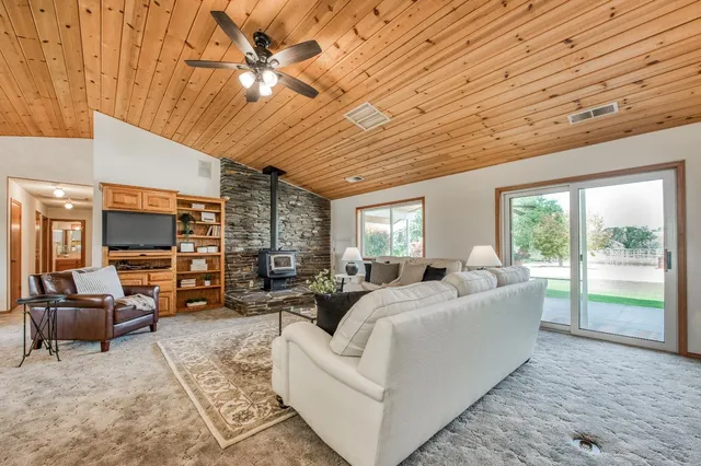 a kitchen with a sink and large window