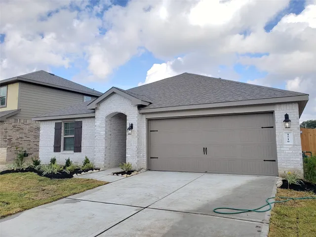 a house view with a garden space