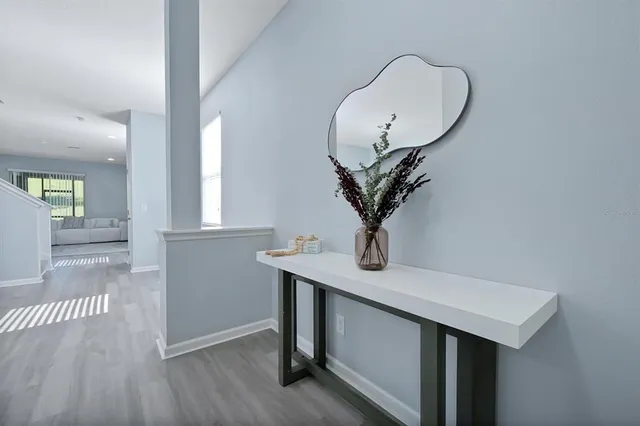 a view of livingroom with furniture and wooden floor