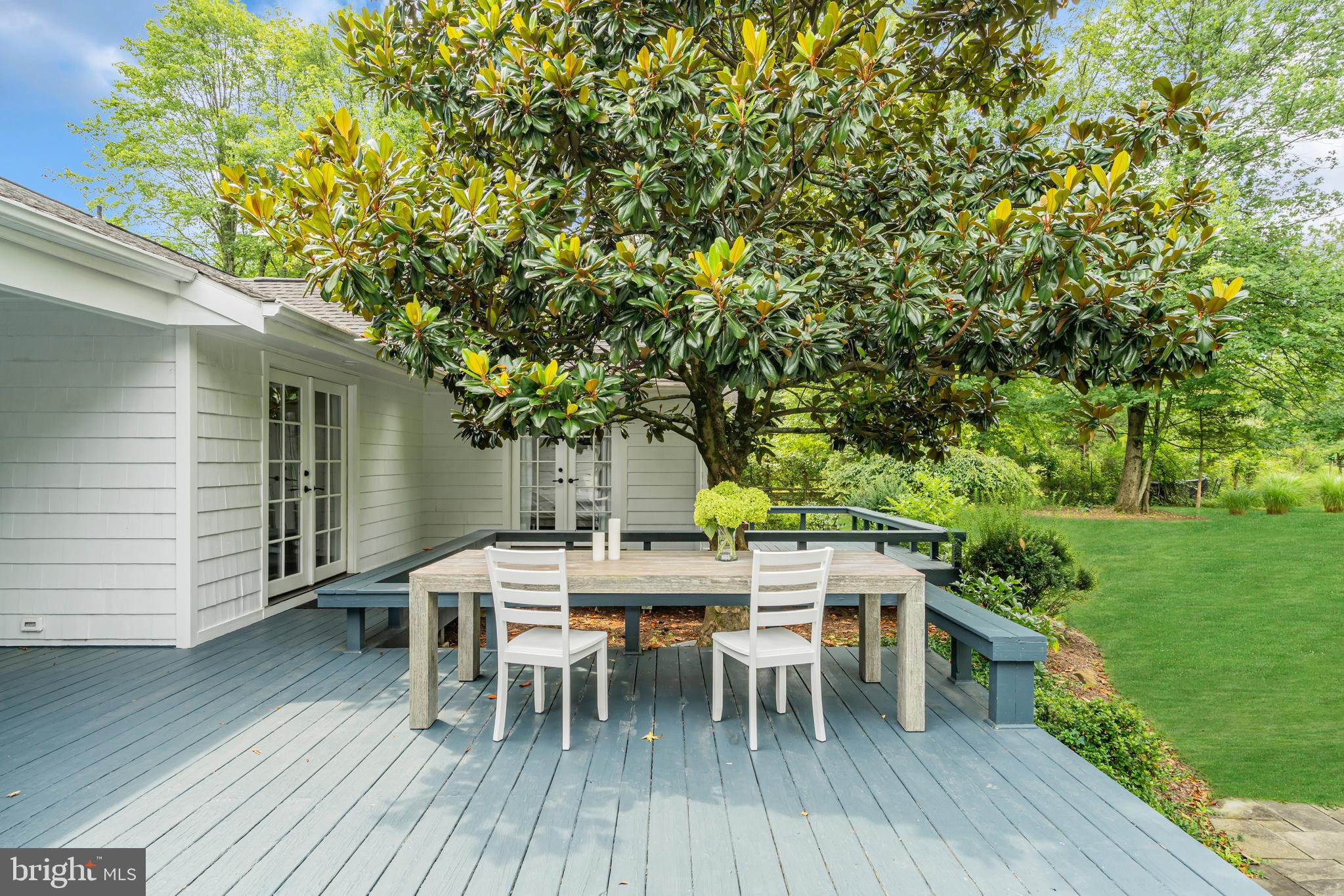 8 Nelson Ridge Road Princeton, NJ 08540 - Photo 35 of 37 Deck with built-in bench below Magnolia tree