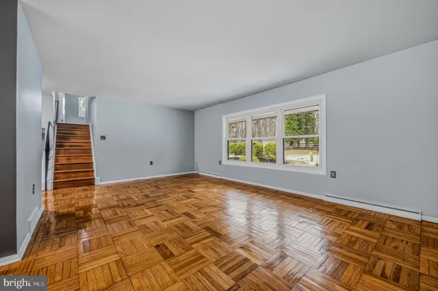 a view of an empty room and window