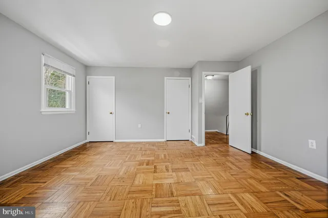 a view of an empty room and window