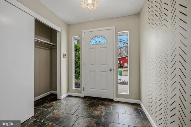 a view of an entryway with window