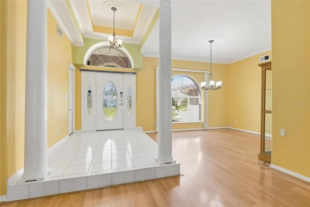 a view of a livingroom with a furniture and a ceiling fan