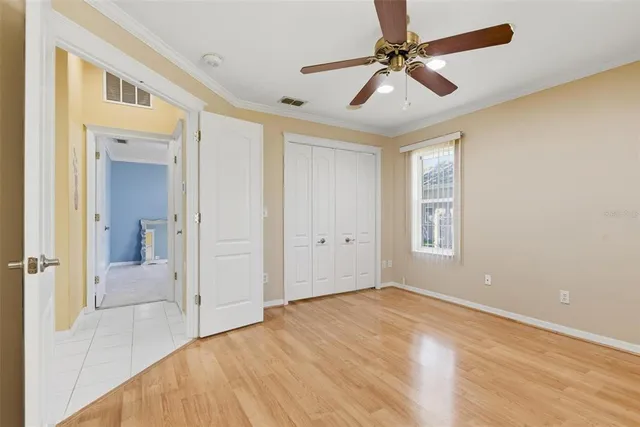 a view of a backyard with table and chairs
