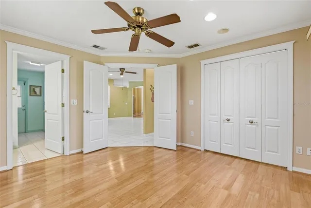a view of a house with backyard porch and sitting area