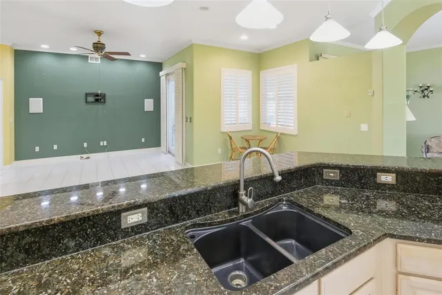 a living room with furniture and a table