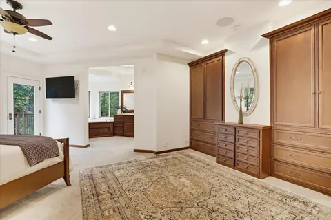 a bathroom with a sink double vanity and a mirror
