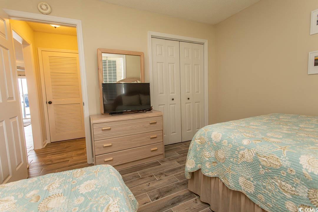 201 Landing Road, Unit D North Myrtle Beach, SC 29582 - Photo 26 of 40 Bedroom with wood finished floors