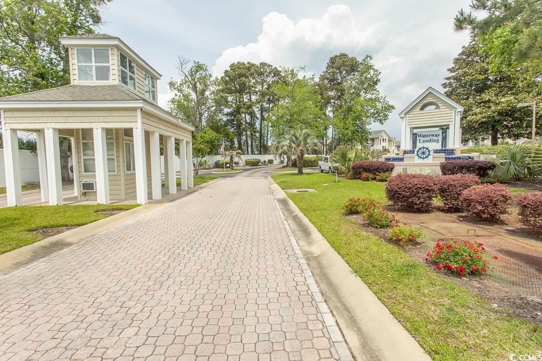 201 Landing Road, Unit D North Myrtle Beach, SC 29582 - Photo 33 of 40 View of road featuring curbs