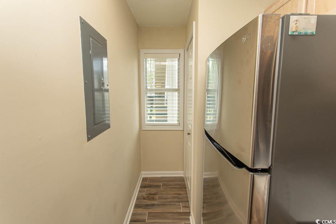 201 Landing Road, Unit D North Myrtle Beach, SC 29582 - Photo 6 of 40 Interior space with wood finished floors, electric panel, and baseboards