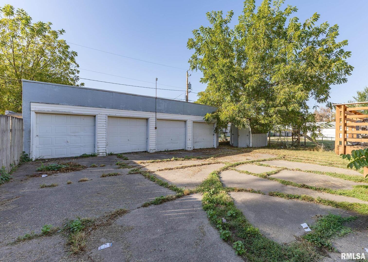 513 6th Avenue South Clinton, IA 52732 - Photo 5 of 11 a house with trees in front of it