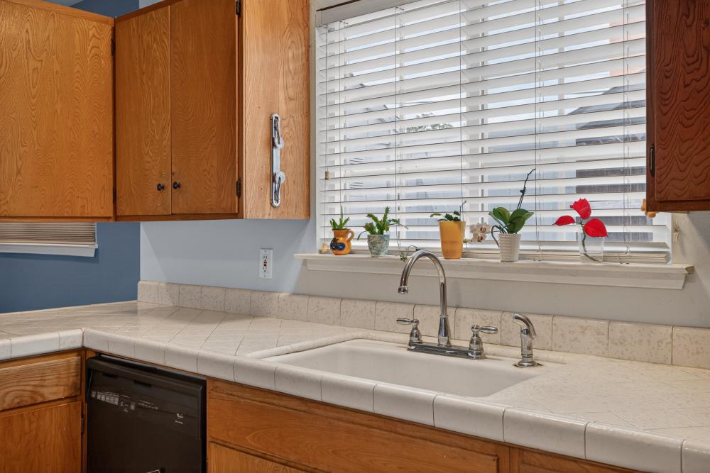 7213 Coronet Court Citrus Heights, CA 95621 - Photo 15 of 52 a kitchen with a sink and a window