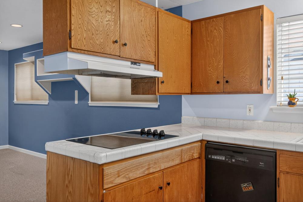 7213 Coronet Court Citrus Heights, CA 95621 - Photo 17 of 52 a kitchen with stainless steel appliances granite countertop a sink stove and cabinets