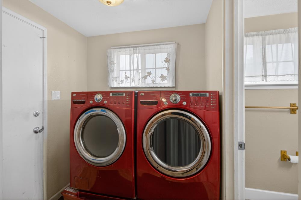 7213 Coronet Court Citrus Heights, CA 95621 - Photo 20 of 52 a view of a bedroom with washer and dryer