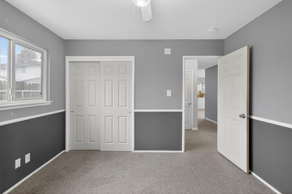 7213 Coronet Court Citrus Heights, CA 95621 - Photo 30 of 52 an empty room with windows and closet